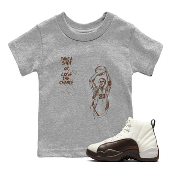 AJ12 Baroque Brown shirts to match jordans Take A Shot best t shirts to wear with jordans SoleFly x Jordan 12 Baroque Brown match shoes to clothes SNRT Sneaker Tees Youth Baby Heather Grey 1 tee
