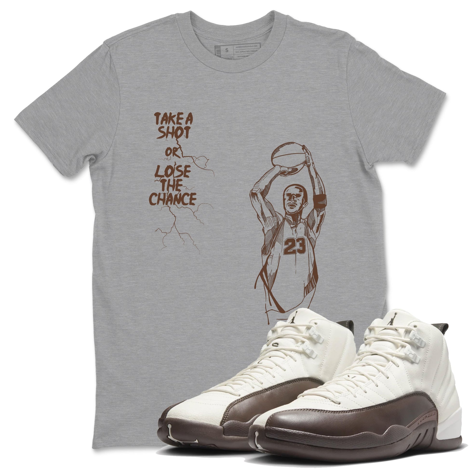 AJ12 Baroque Brown shirts to match jordans Take A Shot best t shirts to wear with jordans SoleFly x Jordan 12 Baroque Brown match shoes to clothes SNRT Sneaker Tees unisex cotton Heather Grey 1 shirts