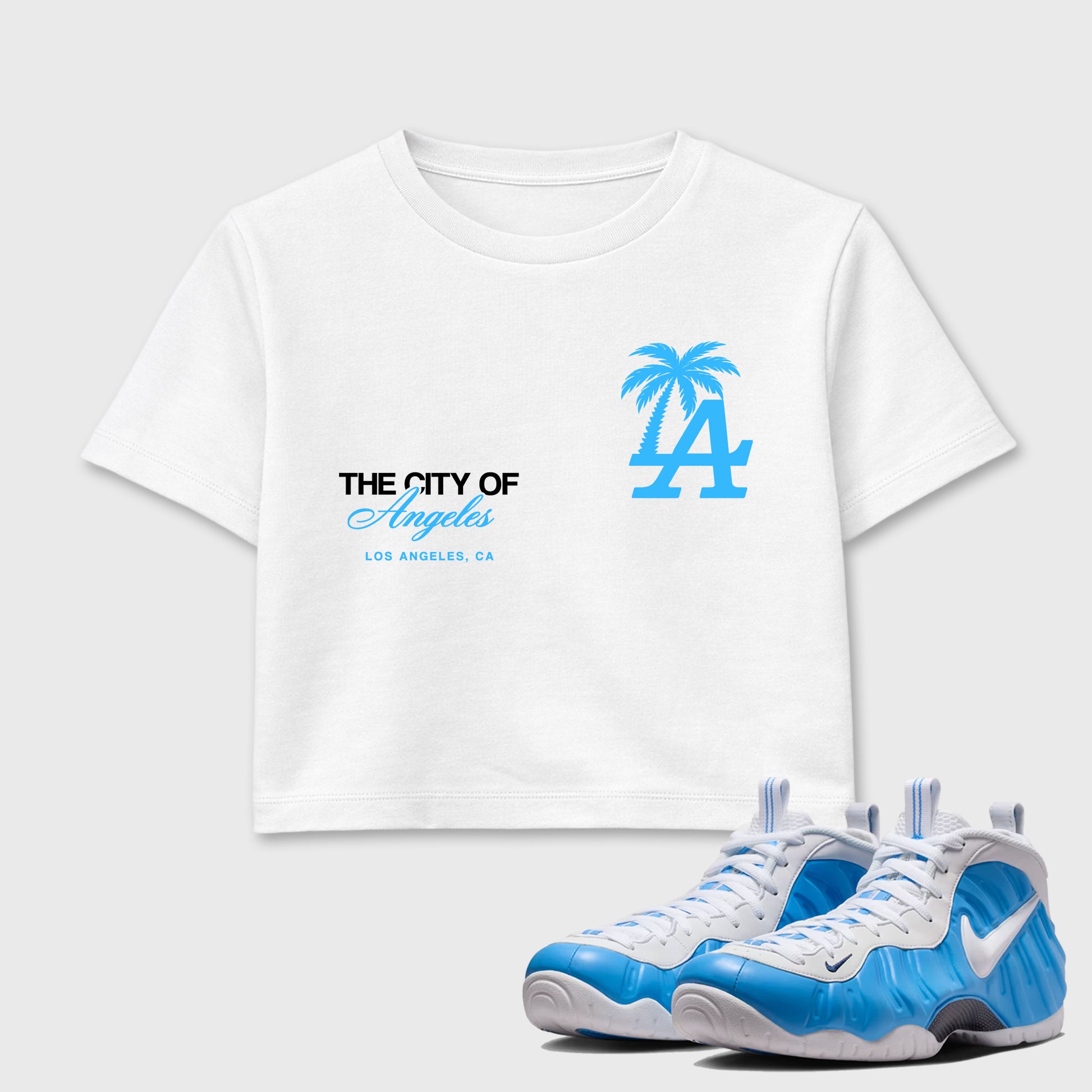 Sneaker match tees – Sneaker Tees To Match Air Foamposite Pro University Blue Shoes – The City Of Angeles Crop T-Shirt White 1