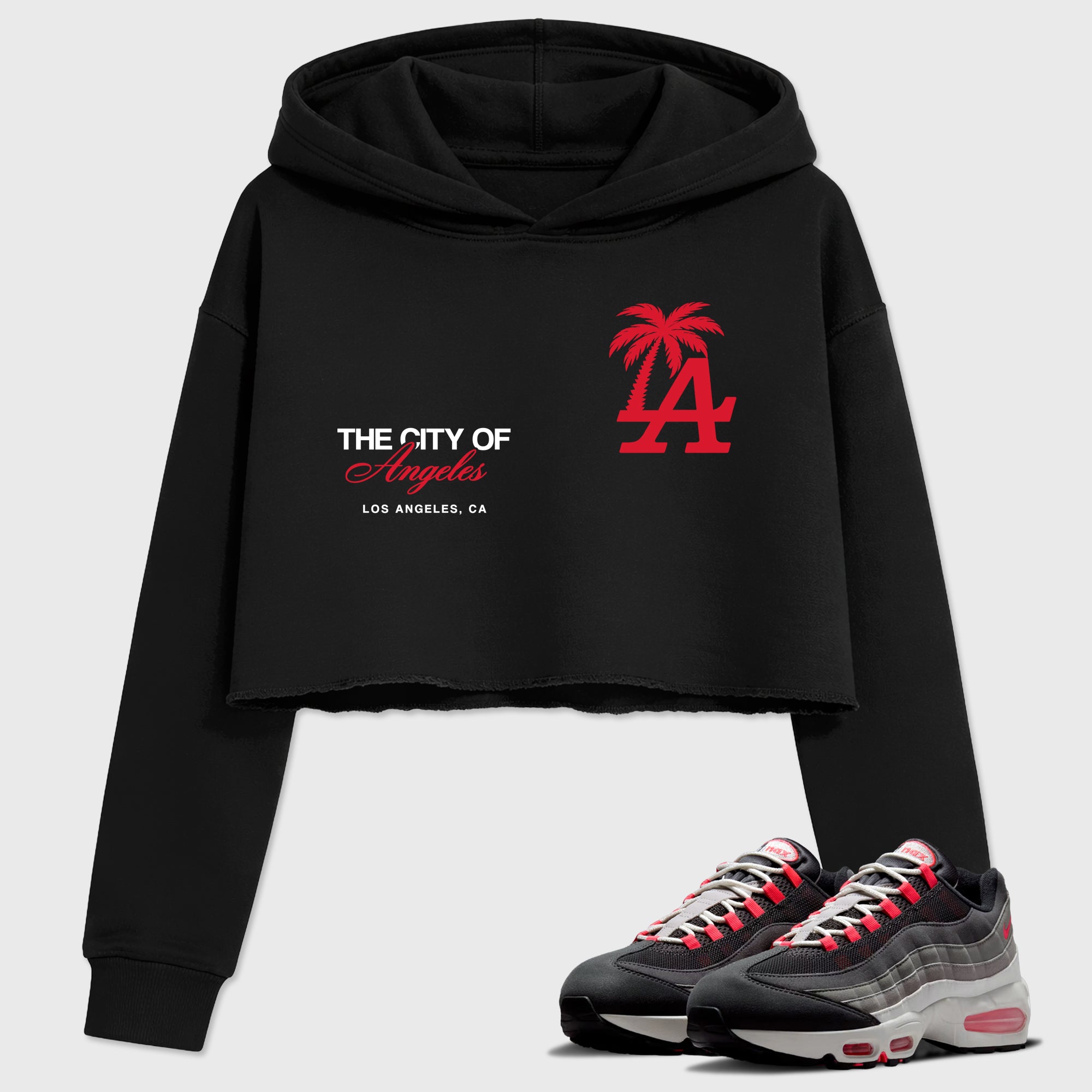 The City Of Angeles Women’s Graphic Crop Tee featuring original streetwear artwork designed to match the Air Max 95 Reverse Solar Red. Black 1 Crop Tee.