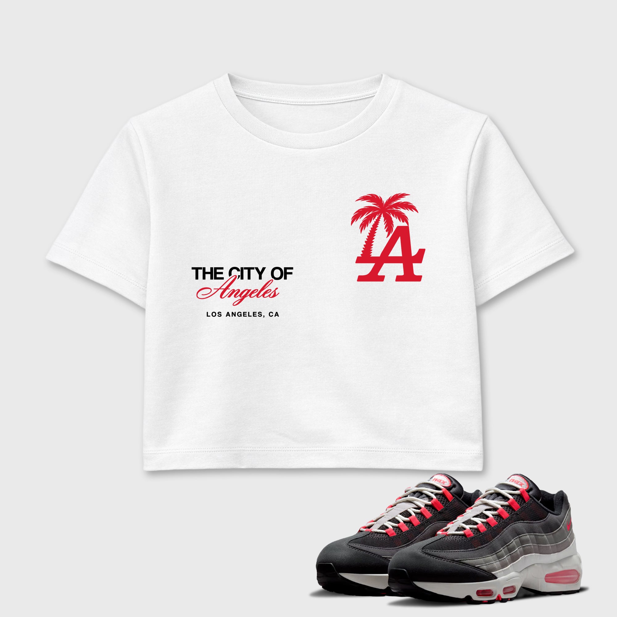 The City Of Angeles women’s crop tee designed to match the Air Max 95 Reverse Solar Red, featuring coordinated White 1 options for a perfect streetwear vibe.