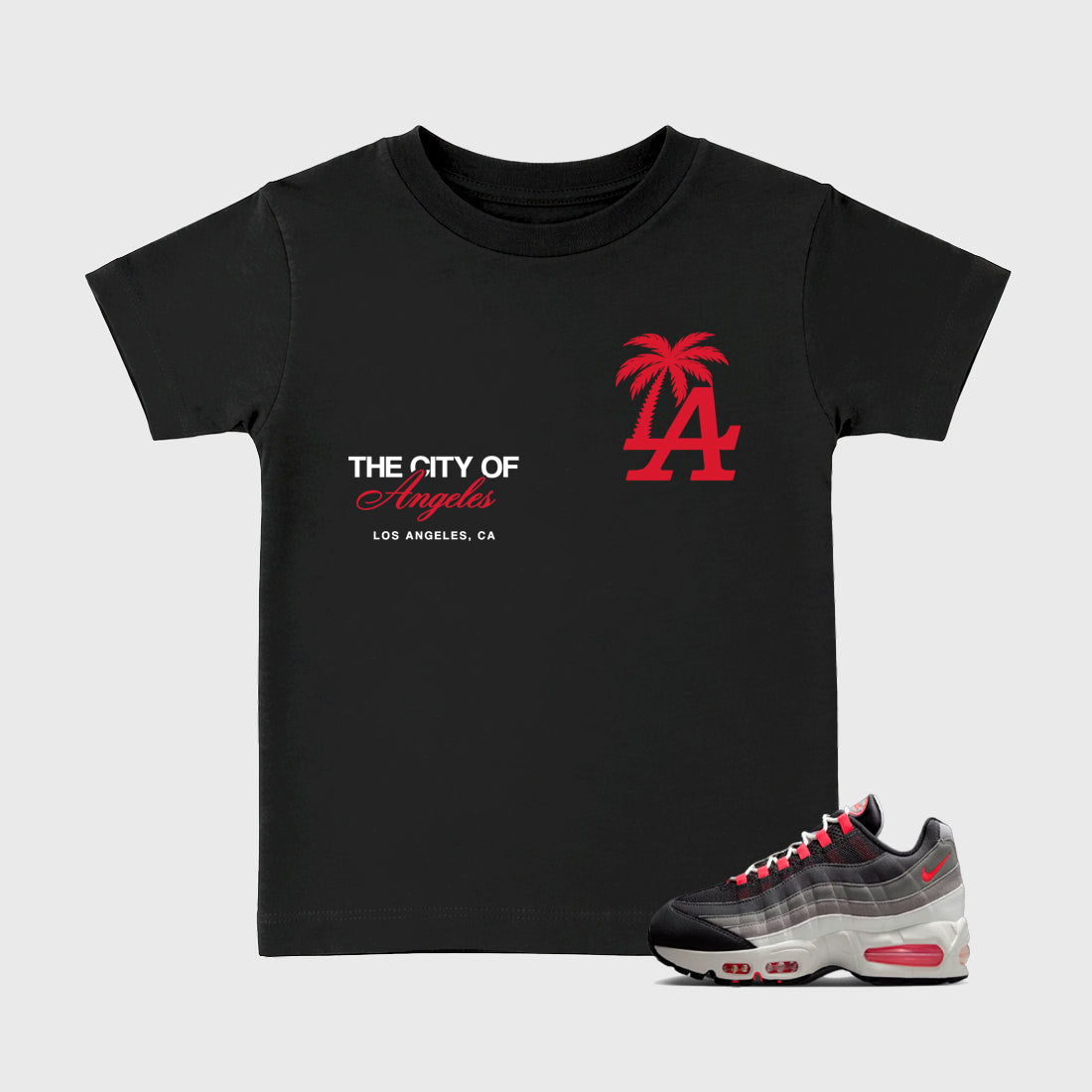 The City Of Angeles Baby & Kids Graphic T-Shirt featuring original artwork designed to match the Air Max 95 Reverse Solar Red. Black 1 Kids Graphic Tee.