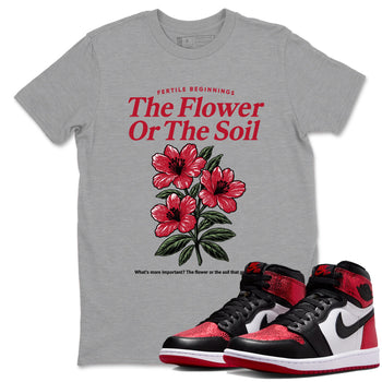 The Flower Or The Soil sneaker match t-shirt styled to complete your fit with the Air Jordan 1 Ruby sneakers, shown in Heather Grey 1.