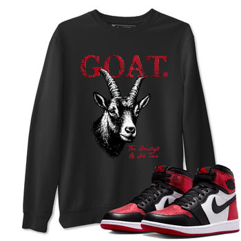 The Greatest Of All Time sneaker match t-shirt styled to complete your fit with the Air Jordan 1 Ruby sneakers, shown in Black 1.