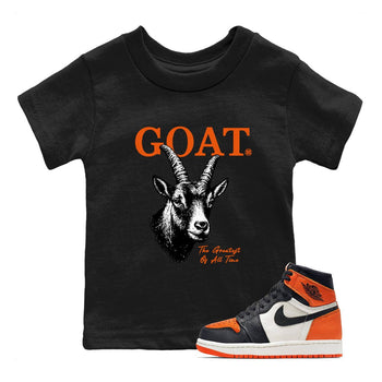 The Greatest Of All Time baby and kids t-shirt crafted for little sneakerheads to shine with the Air Jordan 1 Shattered Backboard sneakers, displayed in Black 1.