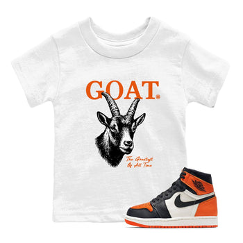 The Greatest Of All Time baby and kids t-shirt crafted for little sneakerheads to shine with the Air Jordan 1 Shattered Backboard sneakers, displayed in White 1.
