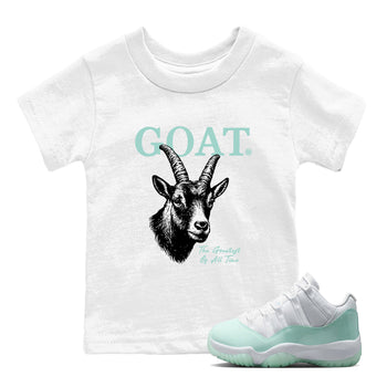 The Greatest Of All Time baby and kids t-shirt crafted for little sneakerheads to shine with the Air Jordan 11 Igloo sneakers, displayed in White 1.
