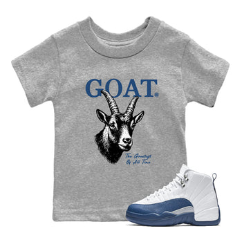 The Greatest Of All Time baby and kids t-shirt crafted for little sneakerheads to shine with the Air Jordan 12 French Blue sneakers, displayed in Heather Grey 1.