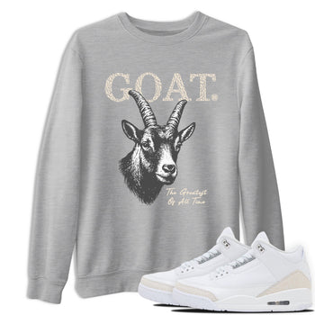 The Greatest Of All Time sneaker match t-shirt styled to complete your fit with the Air Jordan 3 Pure Money sneakers, shown in Heather Grey 1.
