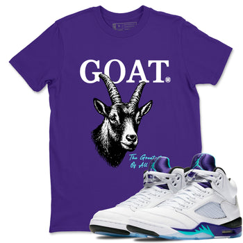 The Greatest Of All Time sneaker match t-shirt styled to complete your fit with the Air Jordan 5 Grape sneakers, shown in Purple 1.