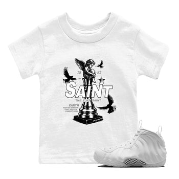 The Lost Saint baby and kids t-shirt crafted for little sneakerheads to shine with the Air Foamposite One Triple White sneakers, displayed in White 1.