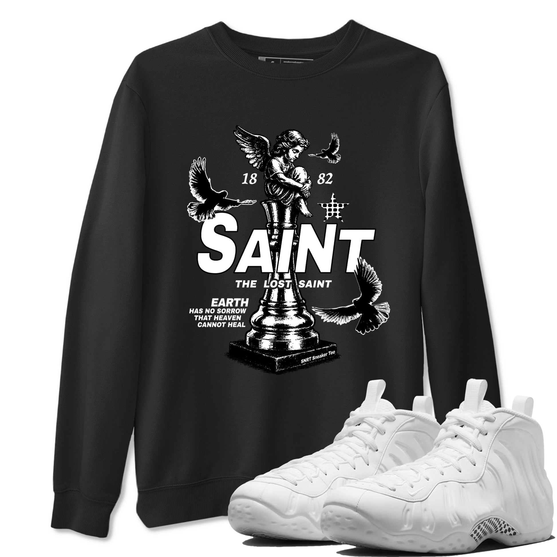 The Lost Saint sneaker match t-shirt styled to complete your fit with the Air Foamposite One Triple White sneakers, graphic shirts in Black 1.