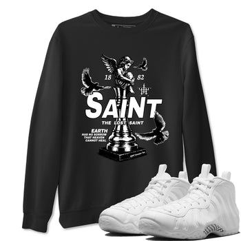The Lost Saint sneaker match t-shirt styled to complete your fit with the Air Foamposite One Triple White sneakers, graphic shirts in Black 1.