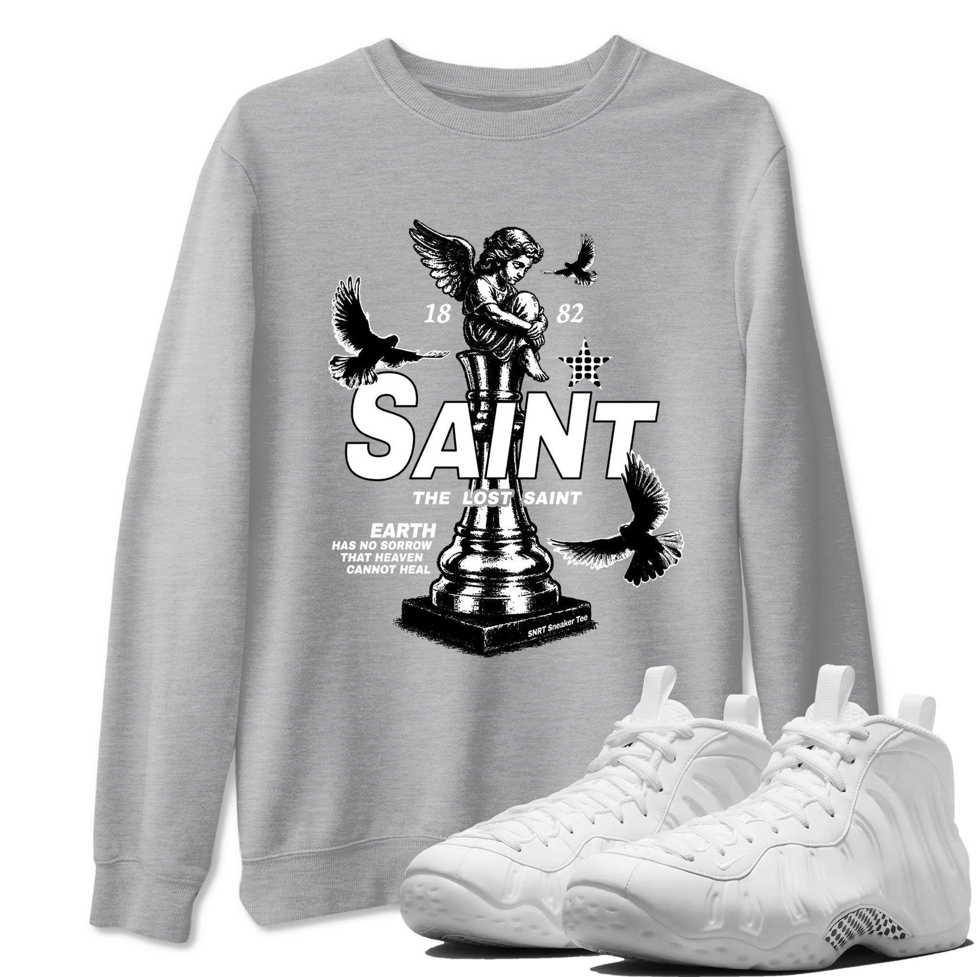 The Lost Saint sneaker match t-shirt styled to complete your fit with the Air Foamposite One Triple White sneakers, graphic shirts in Heather Grey 1.