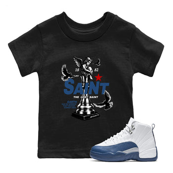 The Lost Saint baby and kids t-shirt crafted for little sneakerheads to shine with the Air Jordan 12 French Blue sneakers, displayed in Black 1.