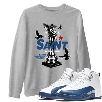 The Lost Saint sneaker match t-shirt styled to complete your fit with the Air Jordan 12 French Blue sneakers, shown in Heather Grey 1.