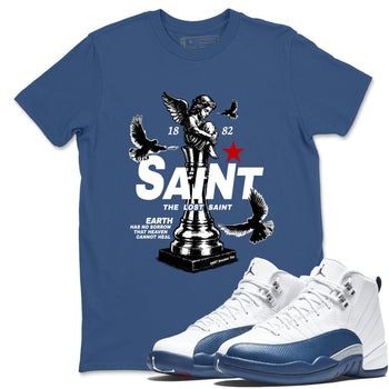 The Lost Saint sneaker match t-shirt styled to complete your fit with the Air Jordan 12 French Blue sneakers, shown in Denim Blue 1.