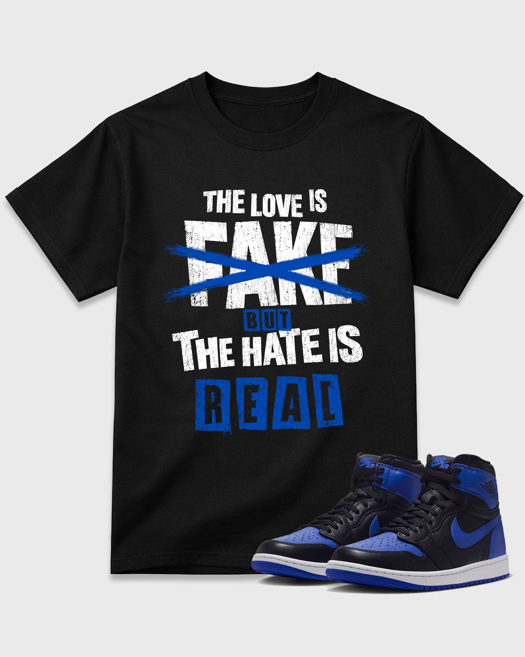 The Love is Fake But the Hate is Real Graphic T-Shirt featuring original streetwear artwork designed to match the Air Jordan 1 Royal. Black 1 Graphic T-Shirt.