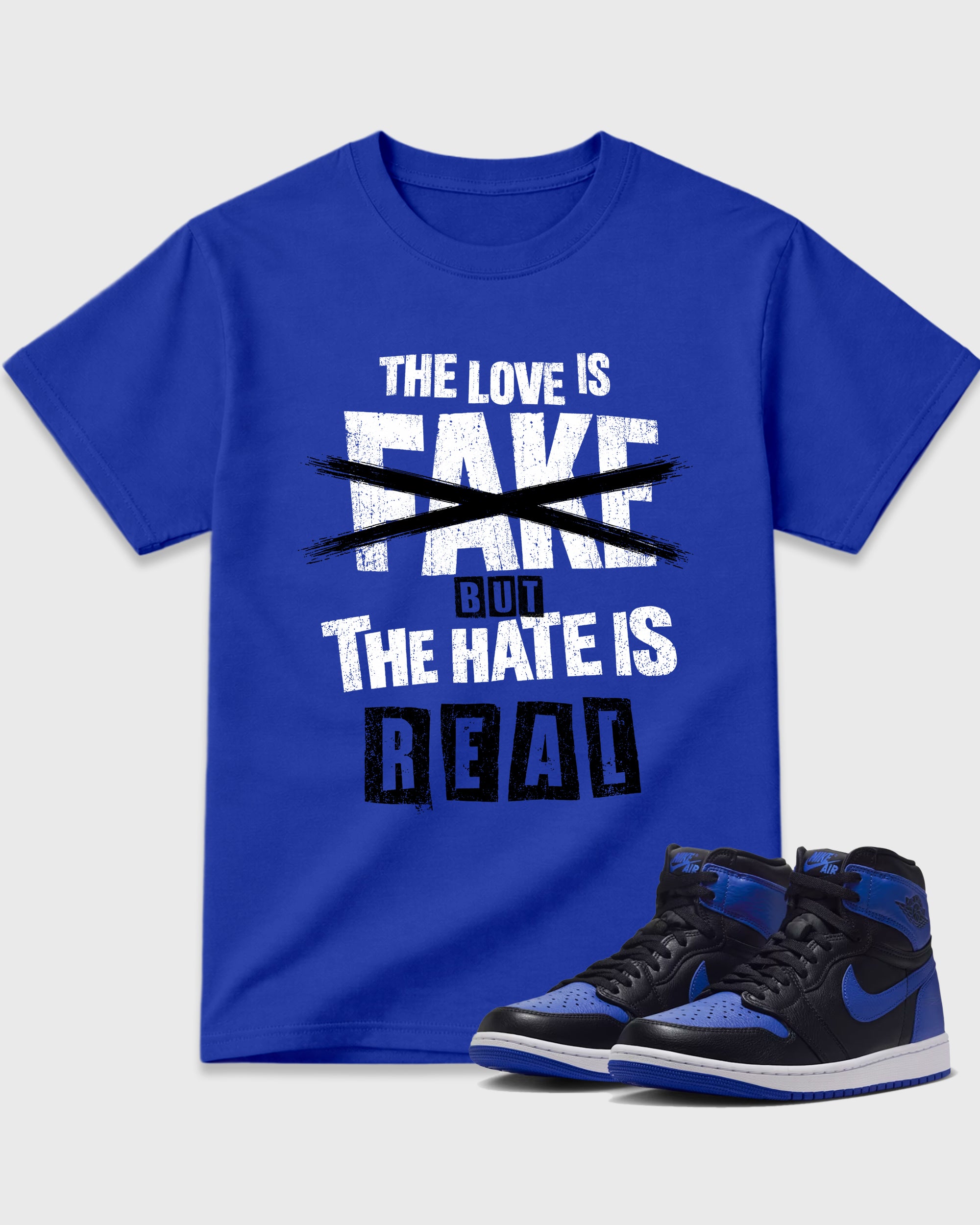 The Love is Fake But the Hate is Real Graphic T-Shirt featuring original streetwear artwork designed to match the Air Jordan 1 Royal. Royal Blue 1 Graphic T-Shirt.