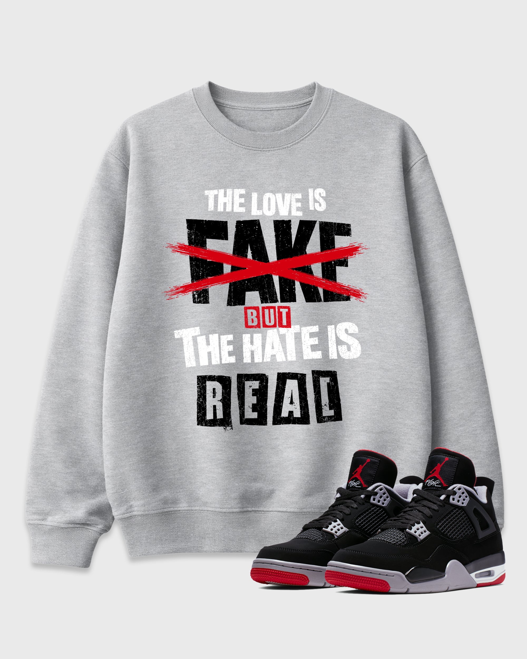 The Love is Fake But the Hate is Real Graphic T-Shirt featuring original streetwear artwork designed to match the Air Jordan 4 Bred. Heather Grey 1 Graphic Tee.