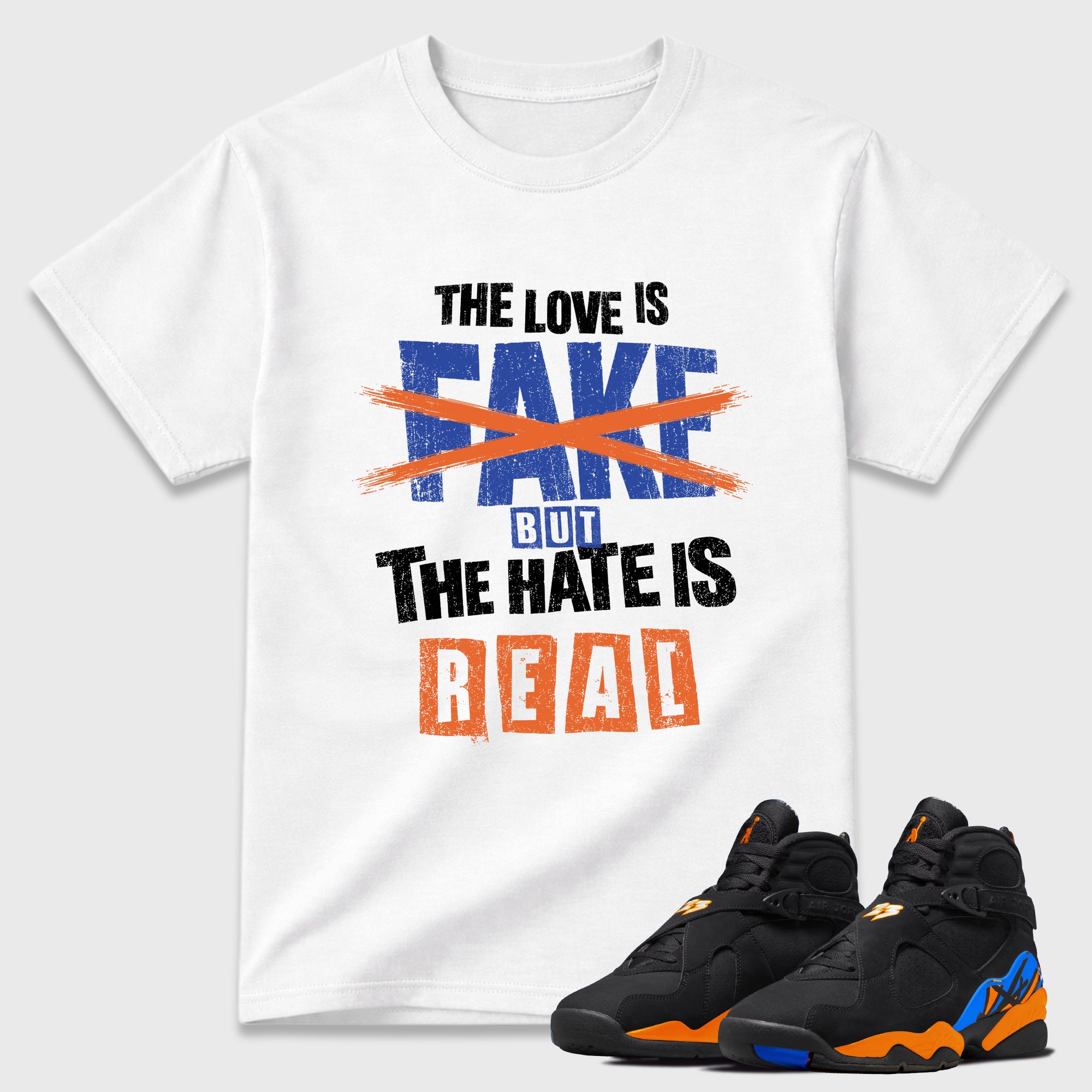 The Love is Fake But the Hate is Real Graphic T-Shirt featuring original streetwear artwork designed to match the Air Jordan 8 Knicks. White 1 Graphic T-Shirt.