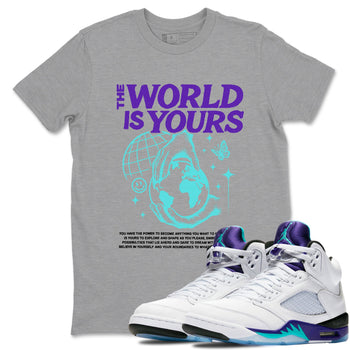 The World Is Yours sneaker match t-shirt styled to complete your fit with the Air Jordan 5 Grape sneakers, shown in Heather Grey 1.