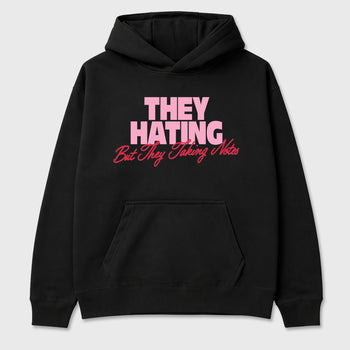 They Hating But Taking Notes Graphic T-Shirt sneaker match tee designed for the Air Jordan 1 Travis Scott Tropical Pink, featuring coordinated color options for a perfect streetwear match. Black 2 shirt.