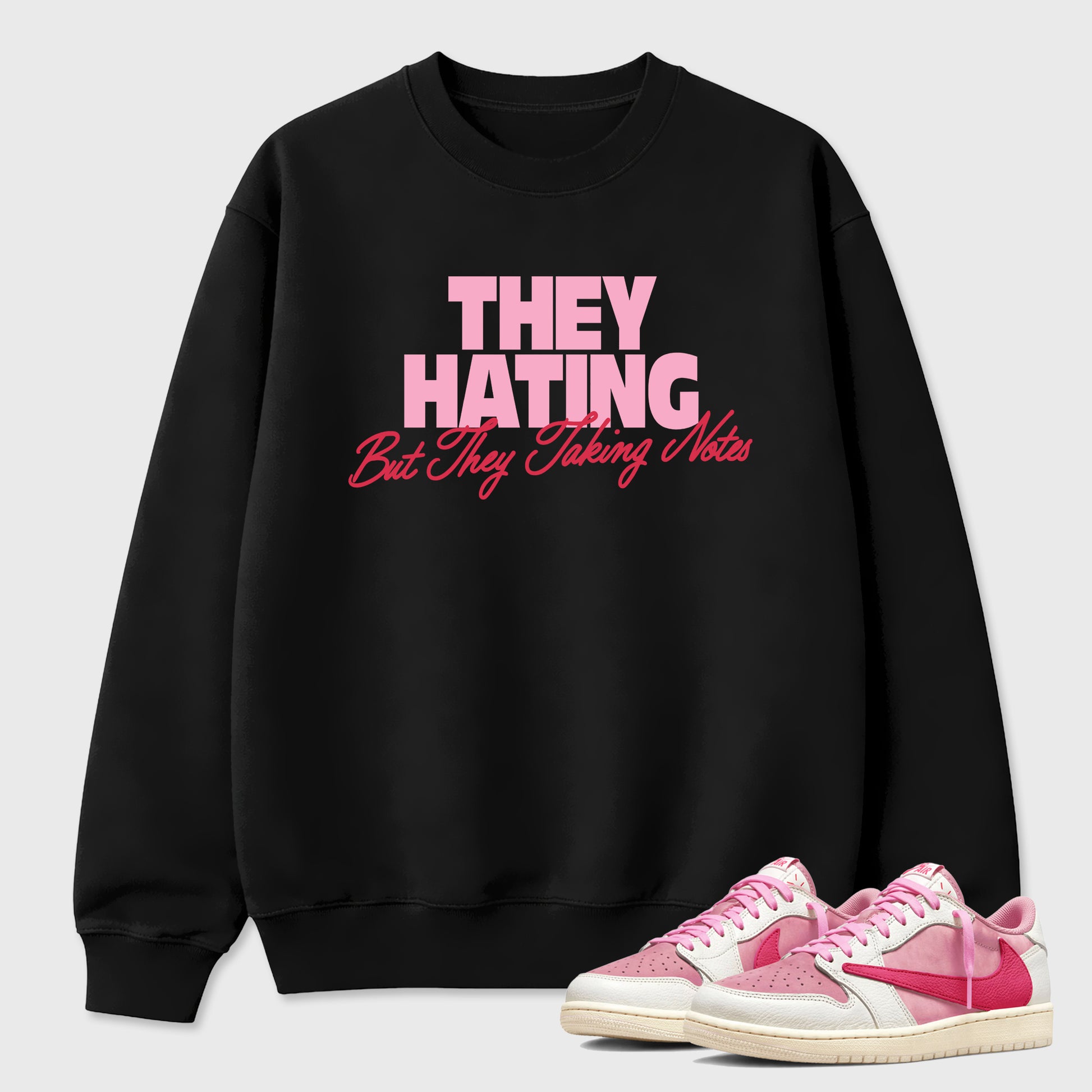 They Hating But Taking Notes Graphic T-Shirt sneaker match tee designed for the Air Jordan 1 Travis Scott Tropical Pink, featuring coordinated color options for a perfect streetwear match. Black 1 shirt.