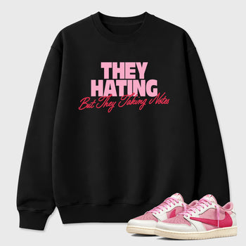 They Hating But Taking Notes Graphic T-Shirt sneaker match tee designed for the Air Jordan 1 Travis Scott Tropical Pink, featuring coordinated color options for a perfect streetwear match. Black 1 shirt.