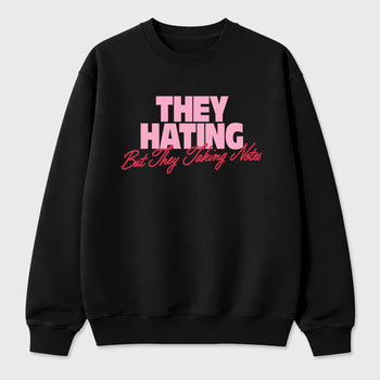 They Hating But Taking Notes Graphic T-Shirt sneaker match tee designed for the Air Jordan 1 Travis Scott Tropical Pink, featuring coordinated color options for a perfect streetwear match. Black 2 shirt.