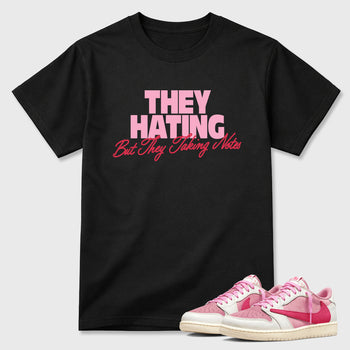 They Hating But Taking Notes Graphic T-Shirt sneaker match tee designed for the Air Jordan 1 Travis Scott Tropical Pink, featuring coordinated color options for a perfect streetwear match. Black 1 shirt.