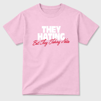 They Hating But Taking Notes Graphic T-Shirt sneaker match tee designed for the Air Jordan 1 Travis Scott Tropical Pink, featuring coordinated color options for a perfect streetwear match. Pink 2 shirt.