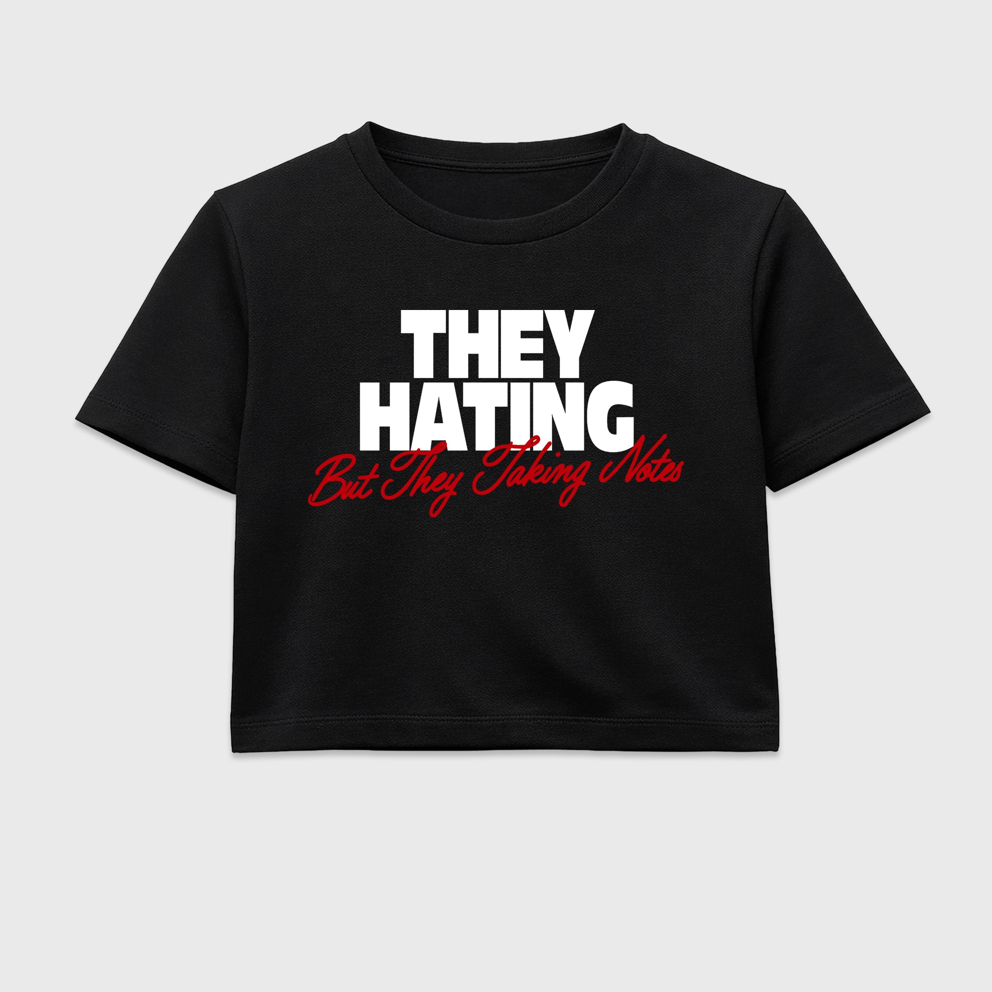They Hating But Taking Notes women’s crop tee designed to match the Air Jordan 9 True Red, featuring coordinated Black 2 options for a perfect streetwear vibe.