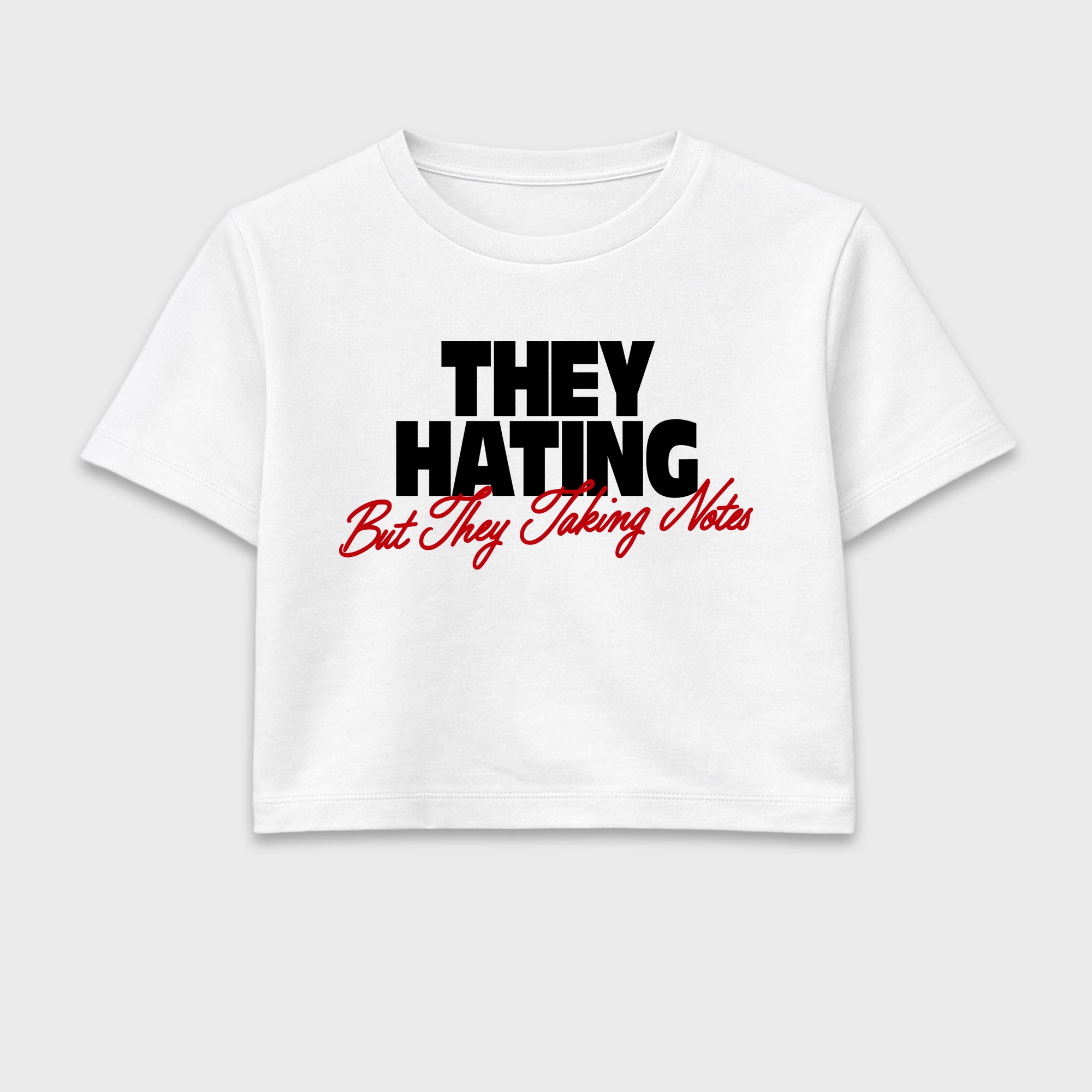 They Hating But Taking Notes women’s crop tee designed to match the Air Jordan 9 True Red, featuring coordinated White 2 options for a perfect streetwear vibe.