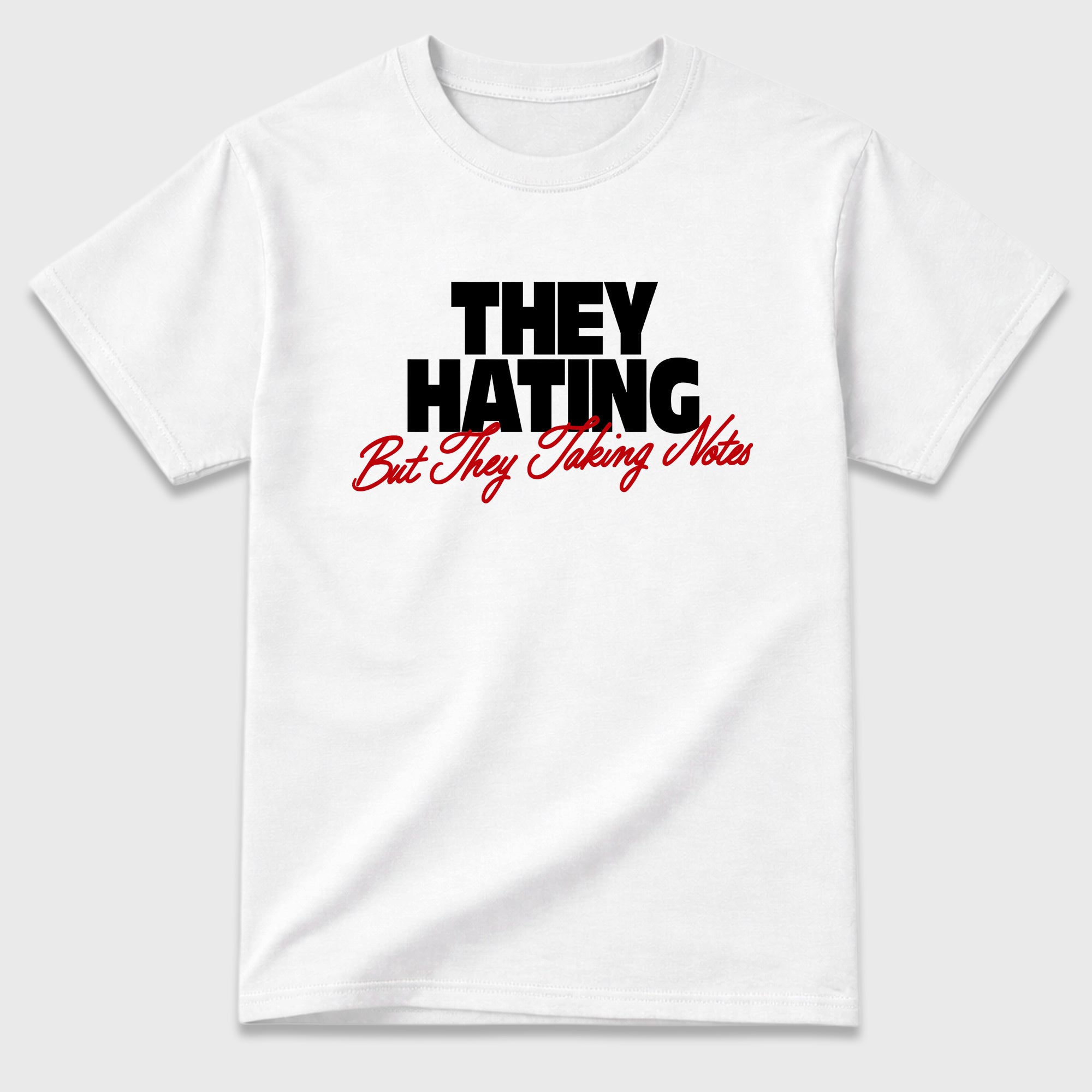 They Hating But Taking Notes Graphic T-Shirt featuring original streetwear artwork designed to match the Air Jordan 9 True Red. White 2 Graphic T-Shirt.