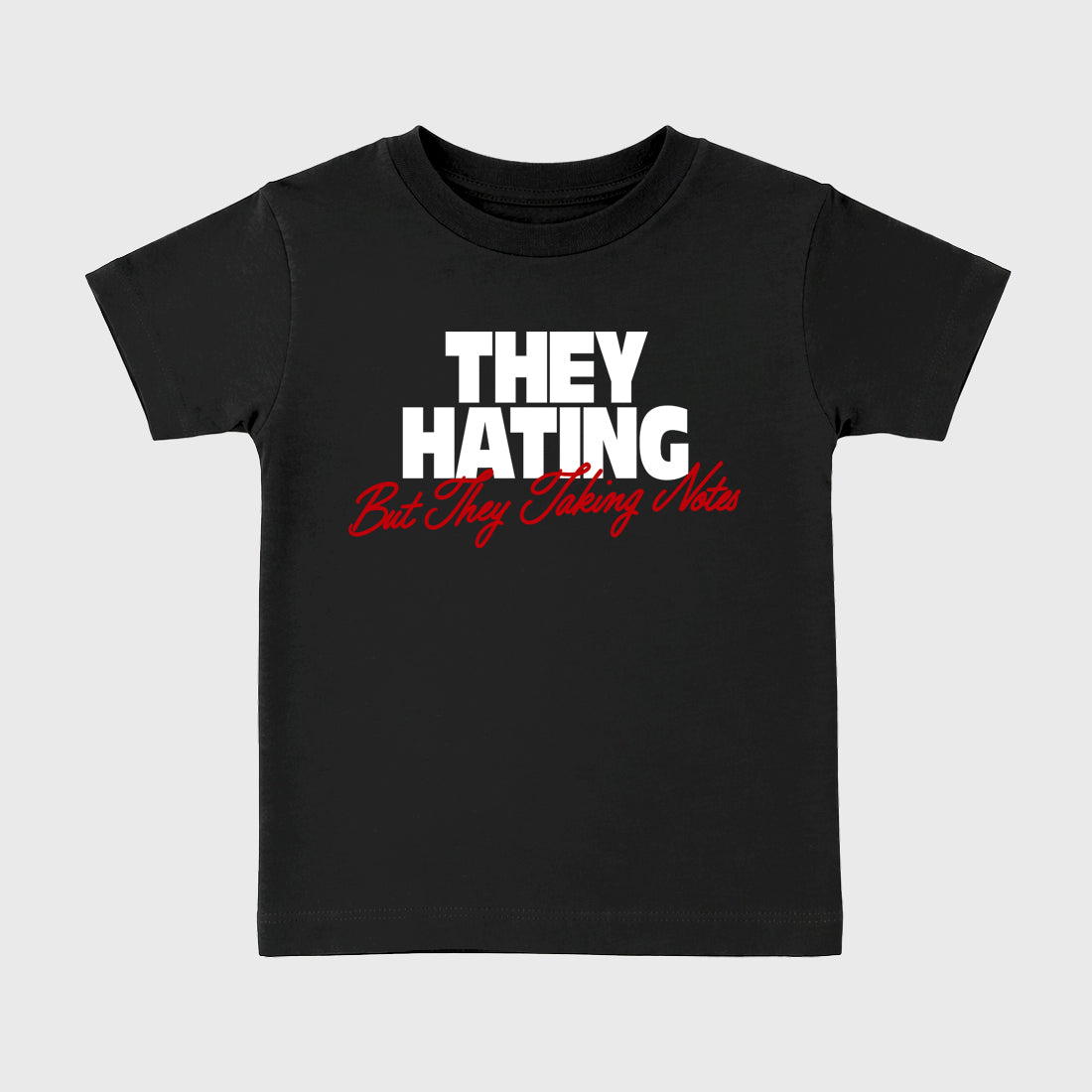 They Hating But Taking Notes Baby & Kids Graphic T-Shirt featuring original artwork designed to match the Air Jordan 9 True Red. Black 2 Kids Graphic Tee.