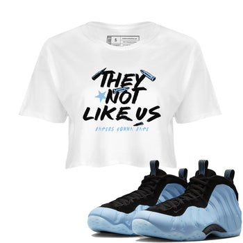 They Not Like Us womens crop tee made to vibe with the Air Foamposite One Psychic Blue sneakers — the perfect match in White 1.