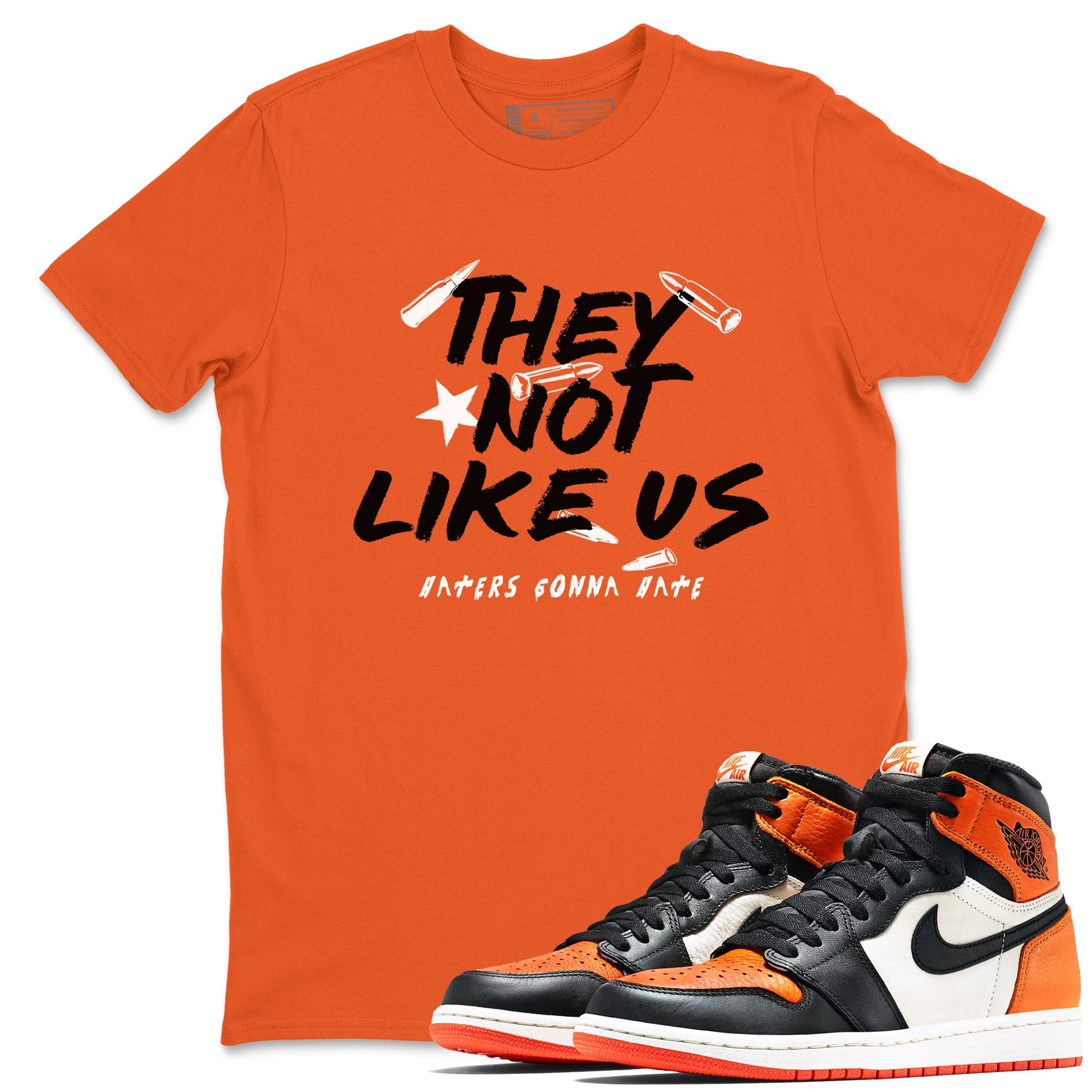 Sneaker match tees – Sneaker Tees To Match Air Jordan 1 Shattered Backboard Shoes – They Not Like Us Tee Orange 1