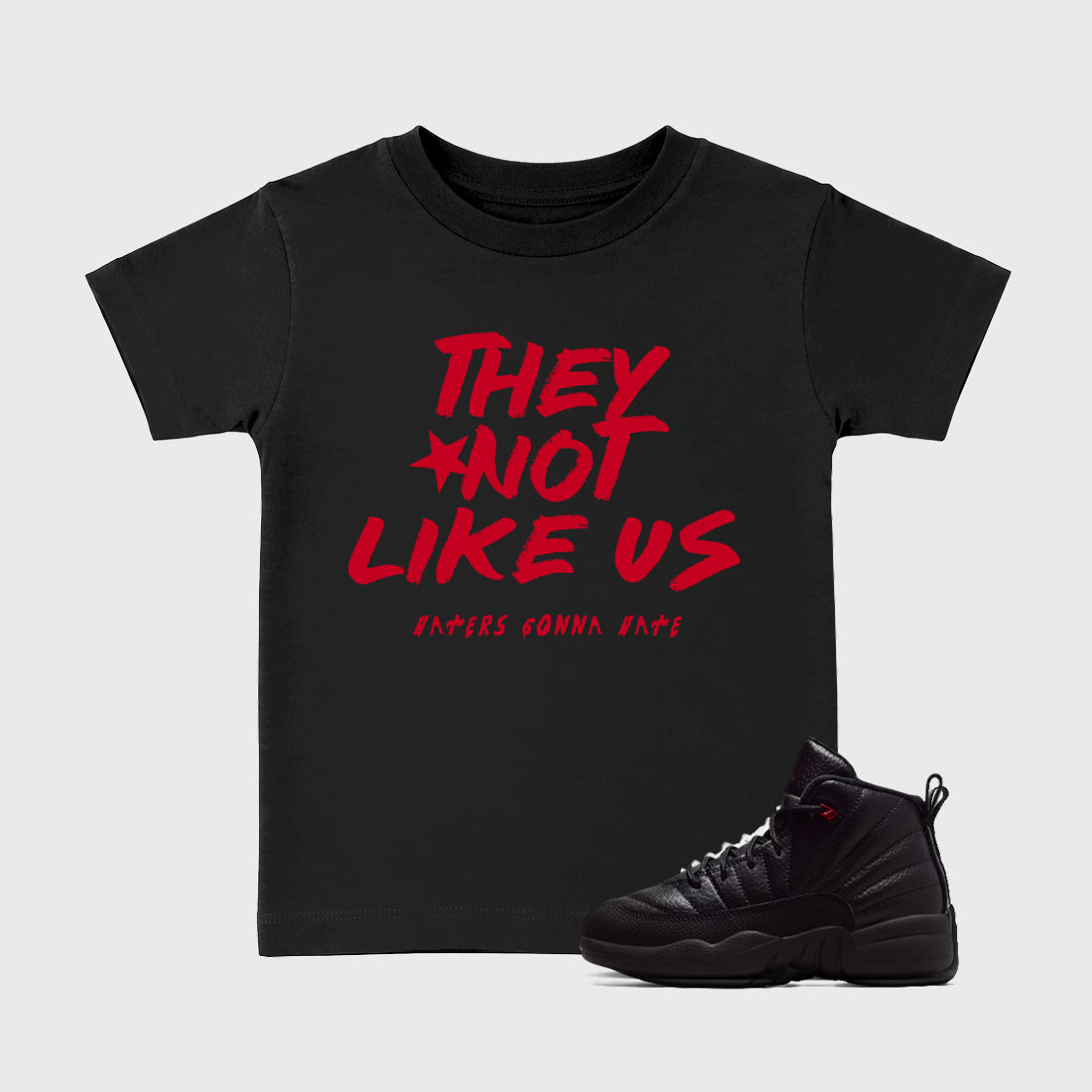 Sneaker match tees – Sneaker Tees To Match Air Jordan 12 Bloodline Shoes – They Not Like Us Kids T-Shirt Black 1