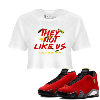 They Not Like Us womens crop tee made to vibe with the Air Jordan 14 Challenge Red sneakers — the perfect match in White 1.