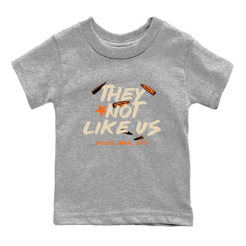 They Not Like Us baby and kids t-shirt crafted for little sneakerheads to shine with the Air Jordan 3 Starfish sneakers, displayed in Heather Grey 2.