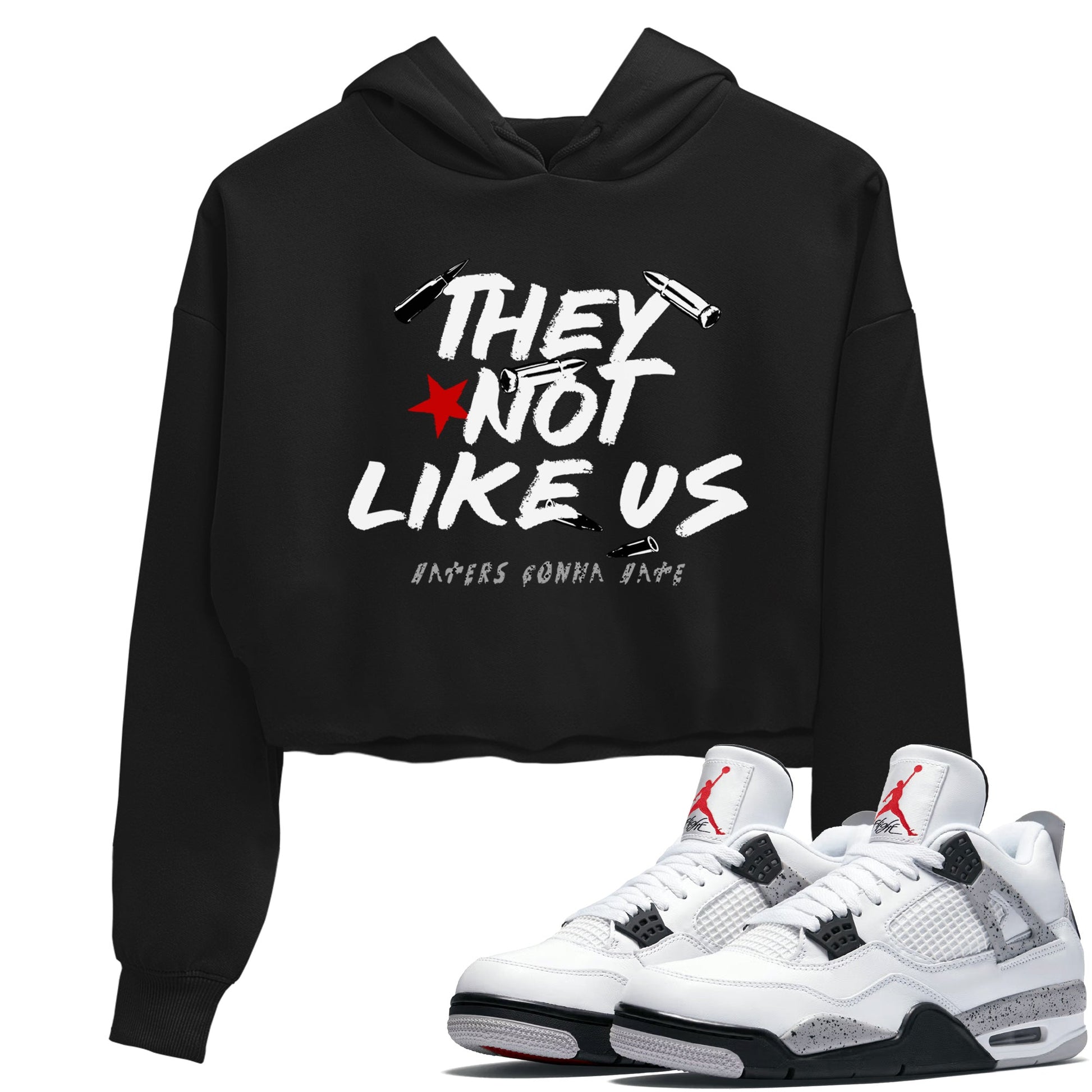 They Not Like Us womens crop tee made to vibe with the Air Jordan 4 White Cement sneakers — the perfect match in Black 1.
