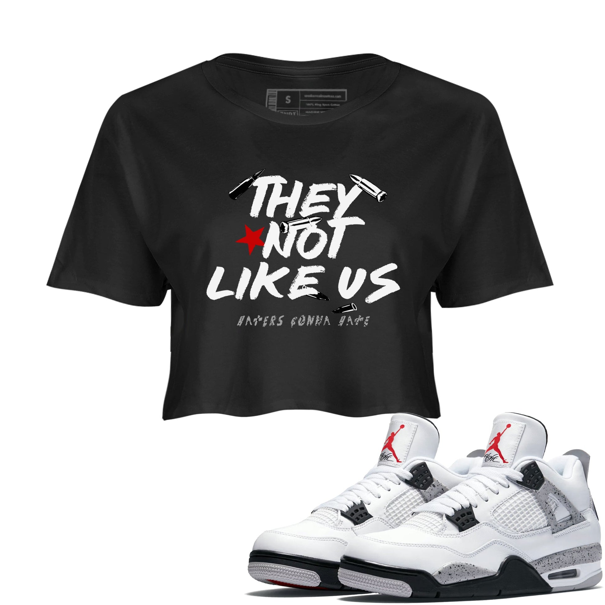 They Not Like Us womens crop tee made to vibe with the Air Jordan 4 White Cement sneakers — the perfect match in Black 1.
