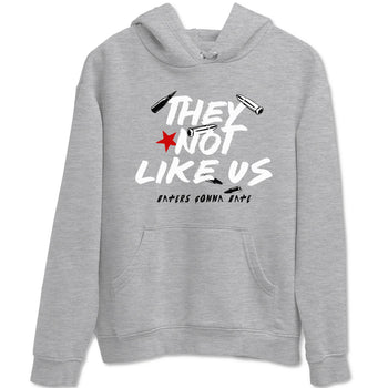 They Not Like Us sneaker match t-shirt styled to complete your fit with the Air Jordan 4 White Cement sneakers, shown in Heather Grey 2.