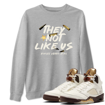 5s Golden Ticket shirts to match jordans  They Not Like Us shirts to match jordans Air Jordan 5 Golden Ticket match shoes to clothes SNRT Sneaker Tees unisex cotton Heather Grey 1 shirts