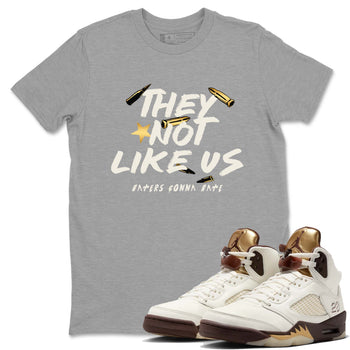 5s Golden Ticket shirts to match jordans  They Not Like Us shirts to match jordans Air Jordan 5 Golden Ticket match shoes to clothes SNRT Sneaker Tees unisex cotton Heather Grey 1 shirts