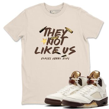 5s Golden Ticket shirts to match jordans  They Not Like Us shirts to match jordans Air Jordan 5 Golden Ticket match shoes to clothes SNRT Sneaker Tees unisex cotton Natural 1 shirts