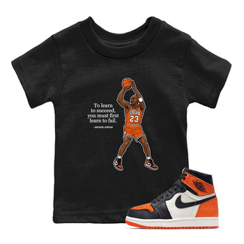 Michael Jordan Quotes To Learn To Succeed You Must First Learn To Fail baby and kids t-shirt crafted for little sneakerheads to shine with the Air Jordan 1 Shattered Backboard sneakers, displayed in Black 1.