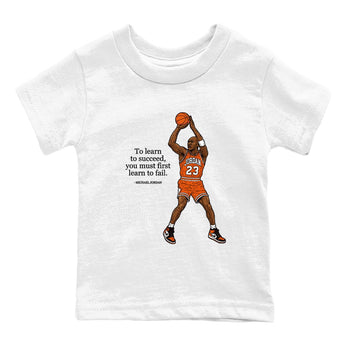 Michael Jordan Quotes To Learn To Succeed You Must First Learn To Fail baby and kids t-shirt crafted for little sneakerheads to shine with the Air Jordan 1 Shattered Backboard sneakers, displayed in White 2.