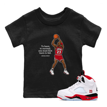 Michael Jordan Quotes To Learn To Succeed You Must First Learn To Fail baby and kids t-shirt crafted for little sneakerheads to shine with the Air Jordan 5 Fire Red sneakers, displayed in Black 1.